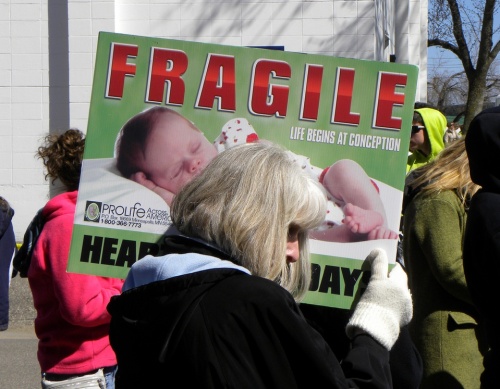 An anti-abortion rally in front of a planned parenthood